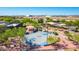 Aerial view of a community basketball court with playground and picnic areas in a well maintained park at 15380 N 100Th St # 1106, Scottsdale, AZ 85260