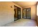 This is a screened in patio with sliding glass doors leading to the interior living space at 15380 N 100Th St # 1106, Scottsdale, AZ 85260