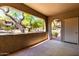 View of the landscaped courtyard from a covered patio space at 15380 N 100Th St # 1106, Scottsdale, AZ 85260