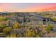Expansive desert landscaped home features mountain views at sunset at 11946 E Cavedale Dr, Scottsdale, AZ 85262