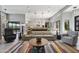 Bright living room showcasing an open floor plan, stylish furnishings, and seamless indoor-outdoor flow at 11946 E Cavedale Dr, Scottsdale, AZ 85262