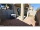 Backyard with covered patio, artificial grass, and AC unit at 2150 W Alameda Rd # 1135, Phoenix, AZ 85085