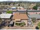 Expansive aerial view of the home and neighborhood showcasing the lush landscaping and beautiful scenery at 848 S Revolta Cir, Mesa, AZ 85208