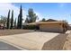 Lovely single-story home featuring a two-car garage and desert-style landscaping at 848 S Revolta Cir, Mesa, AZ 85208