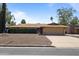 Charming single-story home features a two-car garage and neatly landscaped front yard at 848 S Revolta Cir, Mesa, AZ 85208