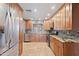 Beautifully remodeled kitchen featuring granite countertops and stainless steel appliances at 848 S Revolta Cir, Mesa, AZ 85208