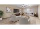 Cozy living room featuring neutral decor, a large window, and comfortable seating at 848 S Revolta Cir, Mesa, AZ 85208