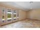 Spacious living room with a view of the beautiful backyard through a glass door at 848 S Revolta Cir, Mesa, AZ 85208