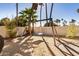 Backyard with grassy area and swing set at 6511 E Presidio Rd, Scottsdale, AZ 85254