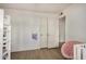 Spacious bedroom with lots of natural light and a pink chair at 6511 E Presidio Rd, Scottsdale, AZ 85254