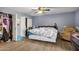 Cozy bedroom with ample closet space and wood flooring at 6511 E Presidio Rd, Scottsdale, AZ 85254