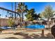 Inviting kidney-shaped pool with safety fence at 6511 E Presidio Rd, Scottsdale, AZ 85254