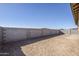 Large backyard with block wall and open space at 16367 W Morning Glory St, Goodyear, AZ 85338