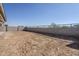 Empty lot behind new construction home with block wall at 16417 W Desert Mirage Dr, Surprise, AZ 85388