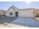 New construction home with a two-car garage at 16417 W Desert Mirage Dr, Surprise, AZ 85388