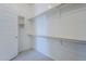 Large walk-in closet with ample shelving and hanging space at 16417 W Desert Mirage Dr, Surprise, AZ 85388