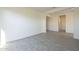 Spacious spare bedroom with tile flooring at 16425 W Desert Mirage Dr, Surprise, AZ 85388