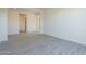 Spacious spare bedroom with tile flooring at 16425 W Desert Mirage Dr, Surprise, AZ 85388