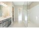 Spa-like bathroom with double vanity and large walk-in shower at 266 S 165Th Ave, Goodyear, AZ 85338