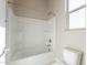 Simple bathroom with a bathtub and shower at 266 S 165Th Ave, Goodyear, AZ 85338