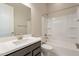 Clean bathroom with a bathtub, shower, and vanity at 266 S 165Th Ave, Goodyear, AZ 85338