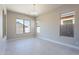 Light-filled dining room with tile floors and large windows at 266 S 165Th Ave, Goodyear, AZ 85338