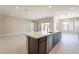 Modern kitchen with a large island and plenty of cabinet space at 266 S 165Th Ave, Goodyear, AZ 85338