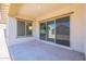 Covered patio with sliding glass doors at 266 S 165Th Ave, Goodyear, AZ 85338