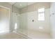 Large walk-in shower with glass enclosure and subway tile at 266 S 165Th Ave, Goodyear, AZ 85338