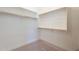 Spacious walk-in closet with ample shelving and hanging rods at 266 S 165Th Ave, Goodyear, AZ 85338