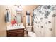 Clean bathroom with single vanity, toilet, and shower/tub combo at 4413 N 24Th Pl, Phoenix, AZ 85016