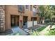 Exterior view of townhome with walkway and small patio at 4413 N 24Th Pl, Phoenix, AZ 85016