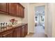 Hallway with built-in cabinets and view into a bedroom at 4413 N 24Th Pl, Phoenix, AZ 85016