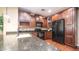 Kitchen boasts granite countertops and stainless steel appliances at 4413 N 24Th Pl, Phoenix, AZ 85016