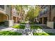 A tree-lined walkway through the community's courtyard at 4413 N 24Th Pl, Phoenix, AZ 85016