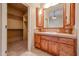 Bathroom with vanity sink and walk-in closet at 19517 W Huron Ln, Buckeye, AZ 85326