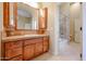 Bathroom with vanity sink, shower, and tiled floor at 19517 W Huron Ln, Buckeye, AZ 85326