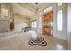 Foyer with detailed marble tile flooring, chandelier lighting, and grand entrance at 19517 W Huron Ln, Buckeye, AZ 85326