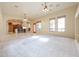 Open concept living room, with great natural light and architectural details at 19517 W Huron Ln, Buckeye, AZ 85326