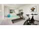 Home gym featuring treadmill and exercise bike at 34 Biltmore Est, Phoenix, AZ 85016