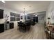 Open dining area with chandelier and view to Gathering room at 532 W Tenia Trl, San Tan Valley, AZ 85140