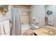 Clean bathroom with tub/shower combo and updated vanity at 1007 N Revere --, Mesa, AZ 85201