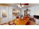 Dining room with a wood table and chairs, offering a view of the kitchen at 1007 N Revere --, Mesa, AZ 85201