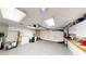 Bright garage with storage cabinets and overhead door at 1007 N Revere --, Mesa, AZ 85201