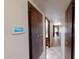 Long hallway with tile flooring and access to other rooms at 1007 N Revere --, Mesa, AZ 85201