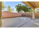 Covered patio and spacious backyard with built-in grill at 2067 W Periwinkle Way, Chandler, AZ 85248