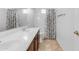 Clean bathroom with double sinks and a shower/tub at 2067 W Periwinkle Way, Chandler, AZ 85248