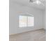 Bright bedroom featuring a large window and ceiling fan at 2067 W Periwinkle Way, Chandler, AZ 85248