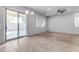 Bright dining area with sliding door to patio at 2067 W Periwinkle Way, Chandler, AZ 85248