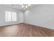 Bright dining room features hardwood floors and chandelier at 2067 W Periwinkle Way, Chandler, AZ 85248